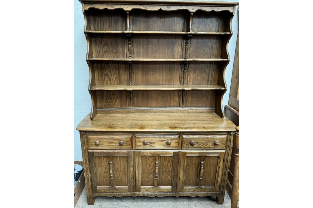 An Ercol dining suite comprising an extending dining table, - Image 2 of 3