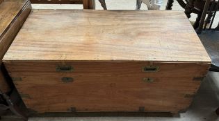 A camphor wood coffer of rectangular form with recessed handles and brass corners 104cm long x 51cm