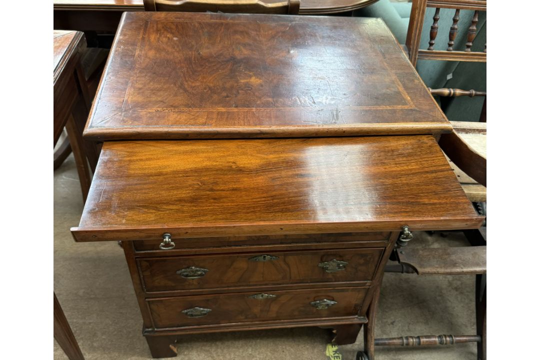 An 18th century style walnut chest with a rectangular crossbanded top above a brushing slide and - Image 2 of 2