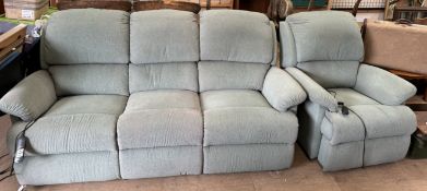 An upholstered reclining three seater settee and matching arm chair