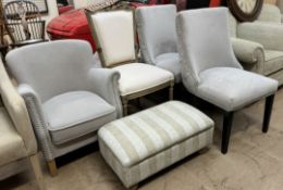 A pair of upholstered dining chairs together with another dining chair,