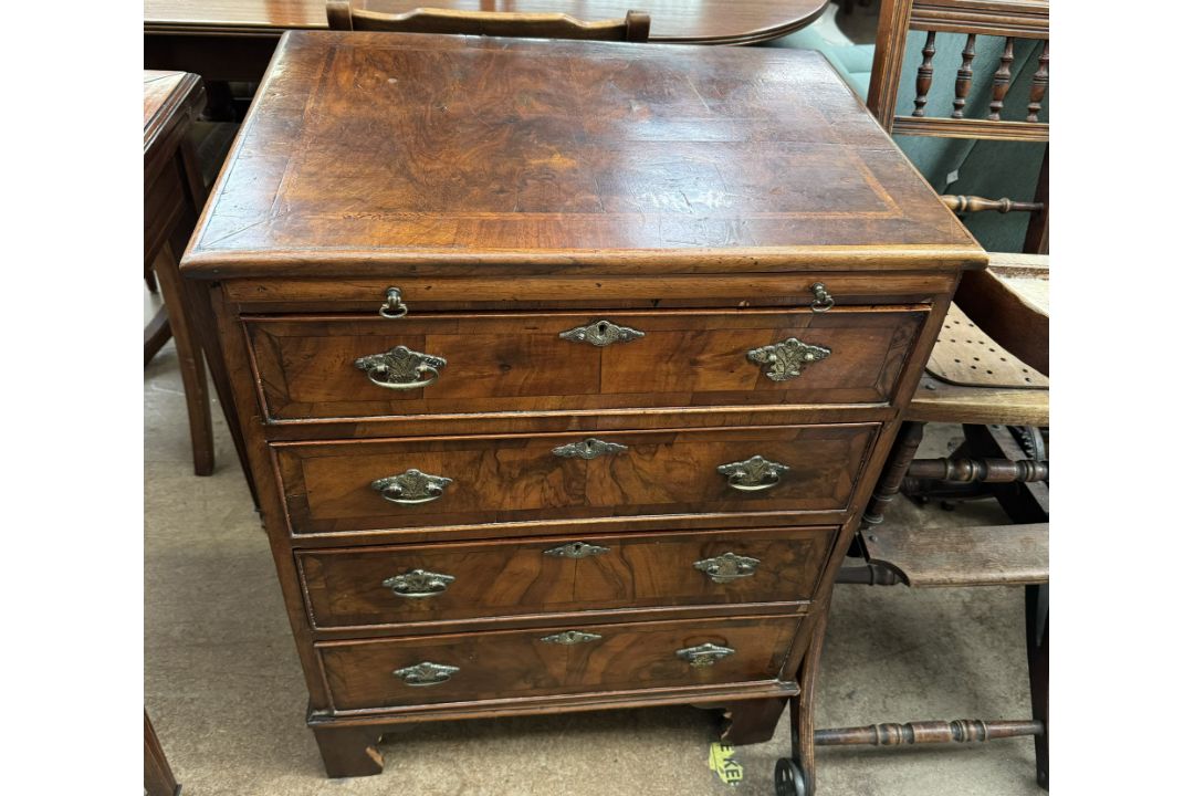 An 18th century style walnut chest with a rectangular crossbanded top above a brushing slide and - Image 1 of 2