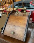 An Edwardian coal scuttle with a brass handle and shovel