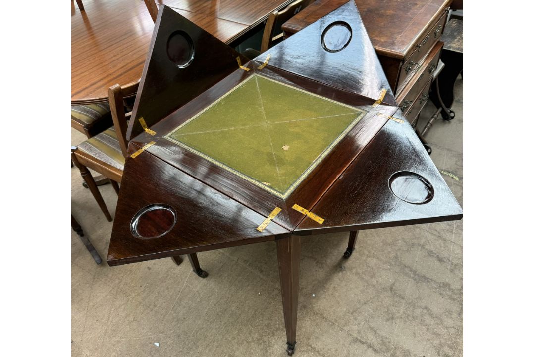 An Edwardian rosewood envelope card table, with a square folding top above a frieze drawer, - Image 2 of 2