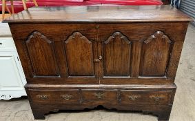 An 18th century oak mule chest,