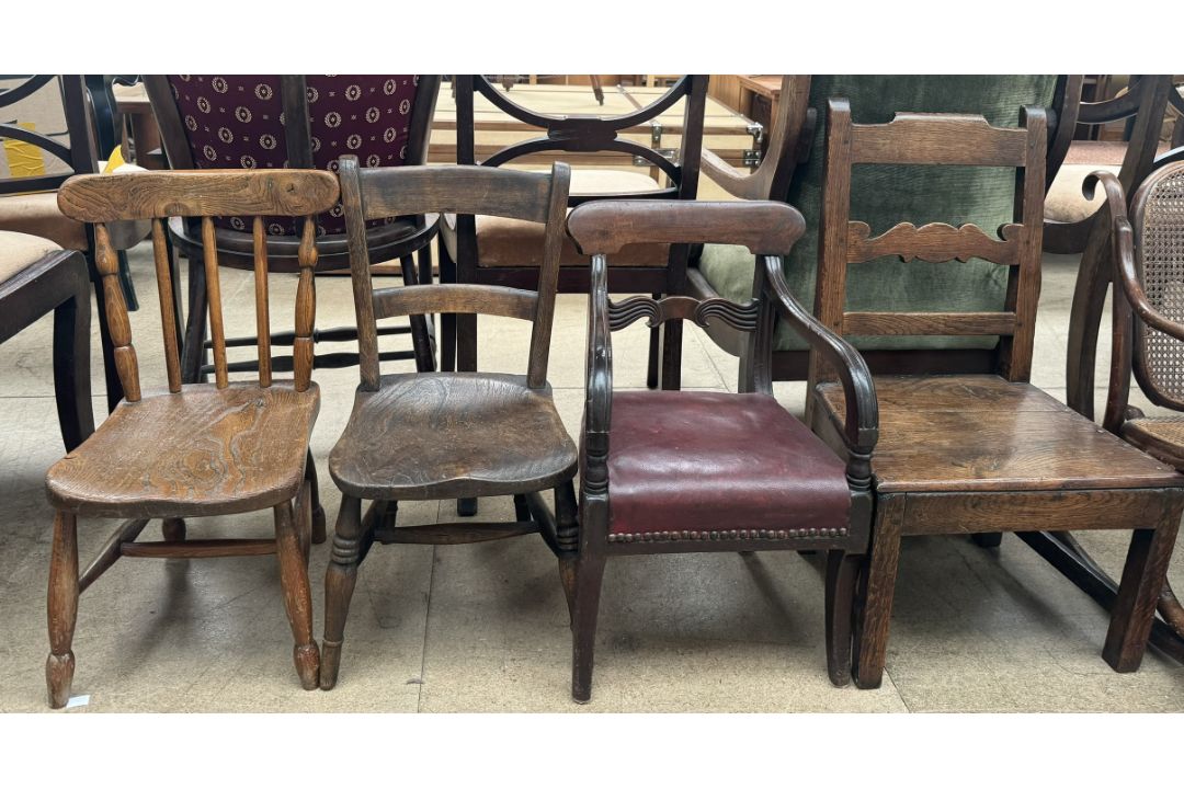 A 19th century mahogany child's elbow chair with a pad seat on splayed legs together with ladder