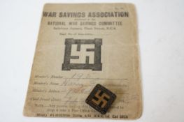 Rare English WWI saving stamp book with swastika s