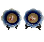 Pair of cherub cabinet plates