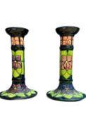 Pair of rare Moorcroft yellow flower pattern candl