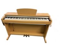 Yamaha Arius electric piano with stool