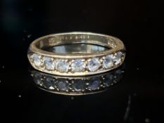 18ct Gold half eternity ring set with 7 white sapp