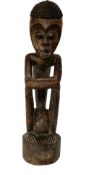 Large carved tribal figure