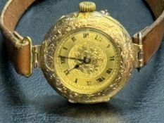 Early 14ct Gold wristwatch, currently ticking