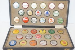 Collection of vintage beer bottle metal caps in fi