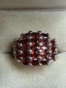 Ladies silver & garnet dress ring