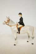 Beswick huntswoman on grey horse