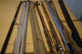 Collection of vintage fishing rods with fibre glas