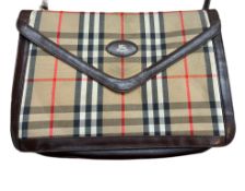 Genuine Burberry clutch bag with shoulder strap -