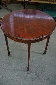 Victorian inlaid table on original casters