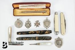 Fruit Knives and Silver Medallions