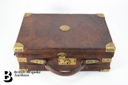 An English Oak and Leather Cartridge Case