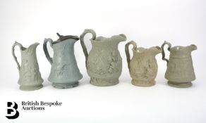 Five 19th Century Relief Moulded Stoneware Jugs