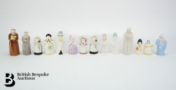 Fourteen Royal Worcester Candle Snuffers