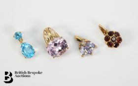 Four 9ct Gold Pendants