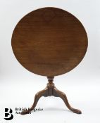 An Oak Tilt Top Wine Table