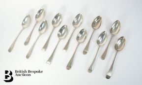 Eight Georgian Silver Serving Spoons