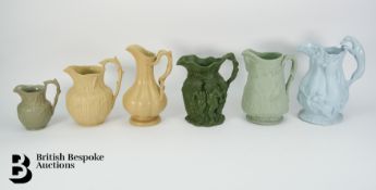 Six 19th Century Relief Moulded Jugs