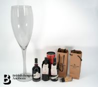 Two Bottles of Gin and One Bottle of Port