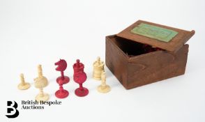 Boxed Set of Chess Pieces.