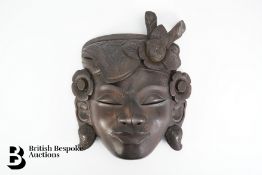 Two African Masks and One Balinese Mask