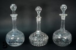 Three Decanters and Stoppers