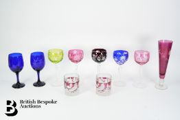 Five Bohemian Coloured Glass Hock Glasses and Cranberry Glass
