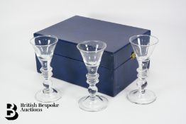 Three Toasting Glasses