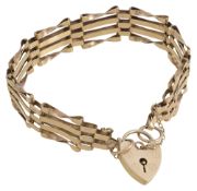 A 9ct four bar gold gate bracelet