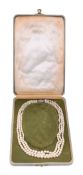 A three strand cultured pearl necklace