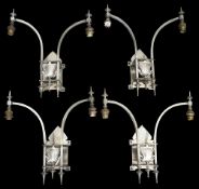 A set of four Edwardian silvered brass two branch wall lights c.1900