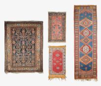 Four early 20th century Persian rugs