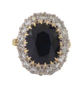 A sapphire and diamond cluster ring