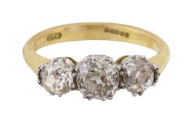 A three stone diamond and 18ct gold ring