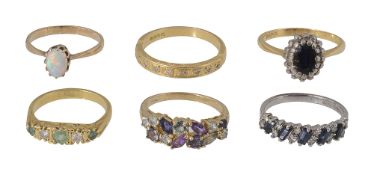 A collection of gem-set rings