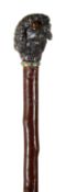 A late 19th century novelty dog head walking cane