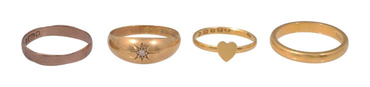 A group of four gold rings