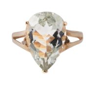A pear shaped aquamarine ring