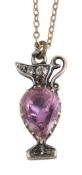 A georgian pink topaz and diamond charm in the form of an urn