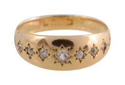 A diamond set gypsy ring