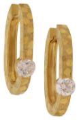 A pair of diamond-set hoop earrings